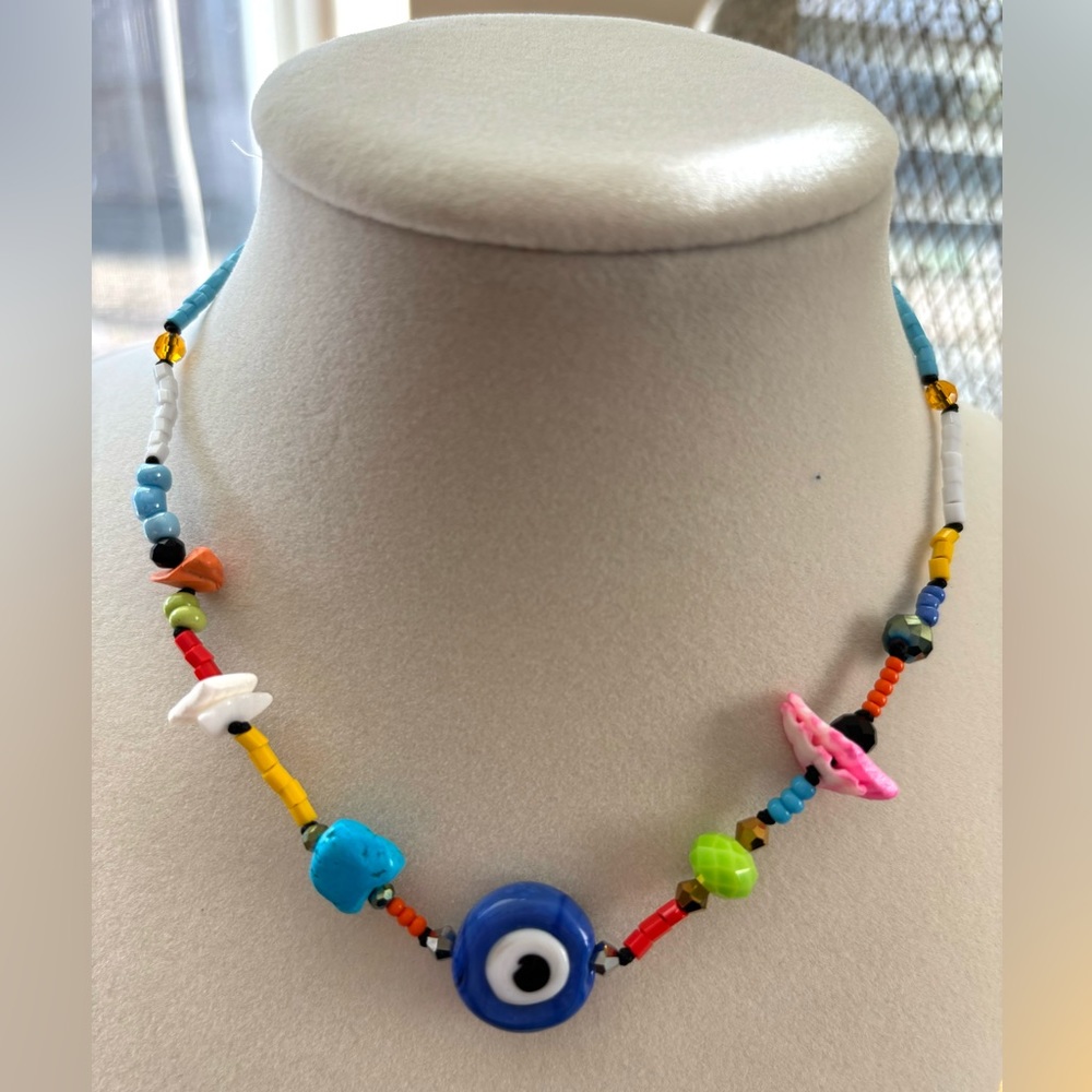 A handmade piece. Blue evil eye necklace for women or teens.